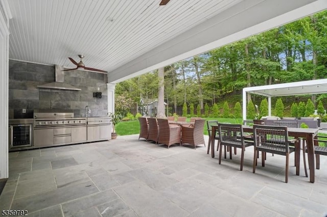 290 Long Hill Dr, Millburn Twp, NJ 07078 - view of patio / terrace with outdoor dining area, wine cooler, a ceiling fan, an outdoor living space, and a sink