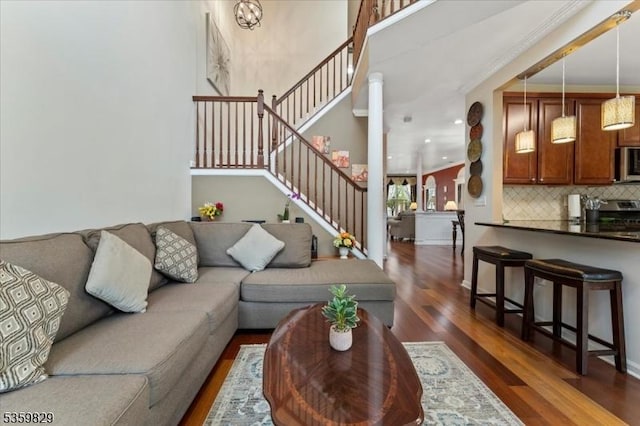 2420 Canterbury Ln, North Brunswick Twp, NJ 08902 - living area with dark wood finished floors, stairway, and baseboards