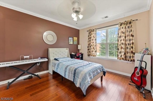 2420 Canterbury Ln, North Brunswick Twp, NJ 08902 - bedroom featuring baseboards, hardwood / wood-style flooring, crown molding, and ceiling fan