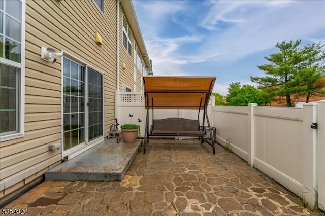 2420 Canterbury Ln, North Brunswick Twp, NJ 08902 - fenced backyard with a patio