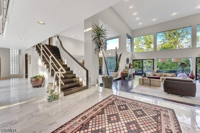 41 Park Way W, Orange Twp, NJ 07052 - entrance foyer with a towering ceiling, stairway, marble tiled flooring, and recessed lighting