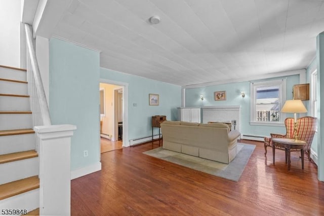 7 Shores Rd, Mendham Twp, NJ 07926 - living area with baseboard heating, a baseboard radiator, wood finished floors, and stairway