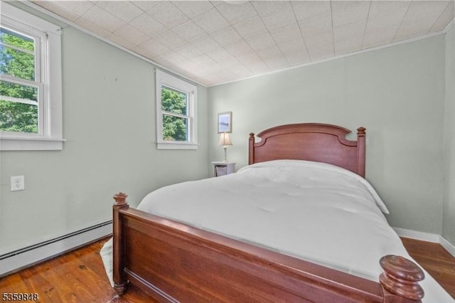 7 Shores Rd, Mendham Twp, NJ 07926 - bedroom with a baseboard radiator, wood finished floors, and crown molding