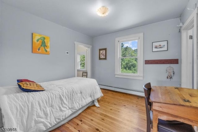 7 Shores Rd, Mendham Twp, NJ 07926 - bedroom with a baseboard radiator and light wood-style floors