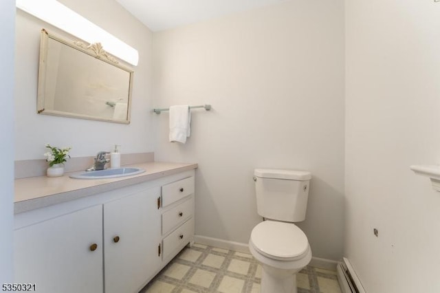 192 Mountain Rd, Pohatcong Twp, NJ 08865 - half bathroom featuring vanity, toilet, baseboards, tile patterned floors, and baseboard heating
