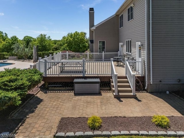 28 Lavada Ln, Raritan Twp, NJ 08551 - view of patio / terrace featuring a deck and an outdoor pool