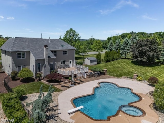 28 Lavada Ln, Raritan Twp, NJ 08551 - view of swimming pool with a wooden deck, a lawn, a patio area, a diving board, and a pool with connected hot tub