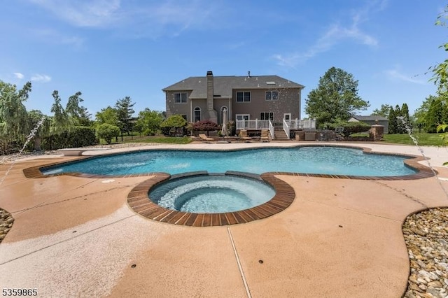 28 Lavada Ln, Raritan Twp, NJ 08551 - view of swimming pool with a wooden deck, a pool with connected hot tub, and a patio area