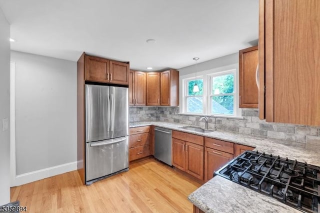10 N Clark St, Ogdensburg Boro, NJ 07439 - kitchen featuring stainless steel appliances, a sink, light wood-style flooring, brown cabinets, and recessed lighting
