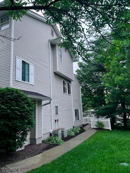 65 Academy Ct, Bedminster Twp, NJ 07921 - view of home's exterior with central AC