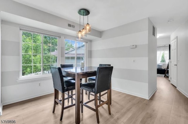 65 Academy Ct, Bedminster Twp, NJ 07921 - dining area featuring plenty of natural light and light wood-style floors