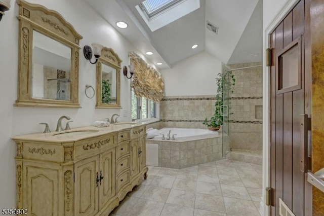 24 Partridge Run, Montvale Boro, NJ 07645 - bathroom featuring a skylight, vaulted ceiling, a garden tub, double vanity, and a stall shower