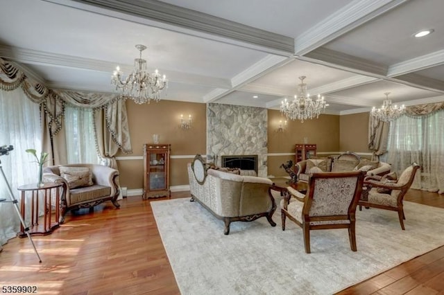24 Partridge Run, Montvale Boro, NJ 07645 - living area featuring a chandelier, wood finished floors, beamed ceiling, a fireplace, and coffered ceiling