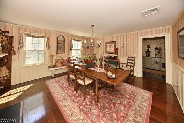 777 E Ridgewood Ave, Ridgewood Village, NJ 07450 - dining space with wallpapered walls, wood finished floors, ornamental molding, a chandelier, and wainscoting