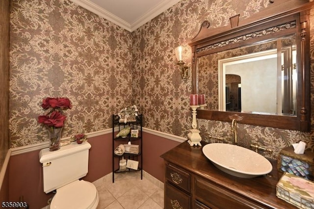 777 E Ridgewood Ave, Ridgewood Village, NJ 07450 - bathroom featuring wainscoting, toilet, vanity, ornamental molding, and tile patterned flooring