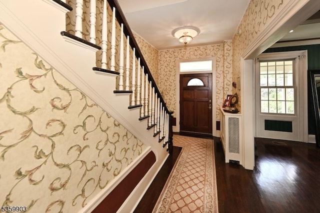 777 E Ridgewood Ave, Ridgewood Village, NJ 07450 - foyer with wallpapered walls, stairs, wood finished floors, and crown molding