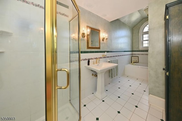 777 E Ridgewood Ave, Ridgewood Village, NJ 07450 - full bath with tile walls, tile patterned flooring, a shower stall, and a garden tub