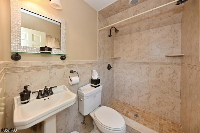 777 E Ridgewood Ave, Ridgewood Village, NJ 07450 - full bathroom with toilet, a tile shower, a sink, and wainscoting