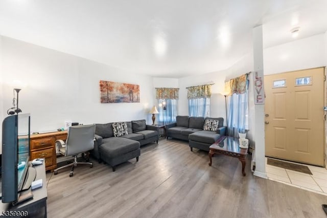 857 Garden St, Elizabeth City, NJ 07202 - living room with light wood finished floors and a desk