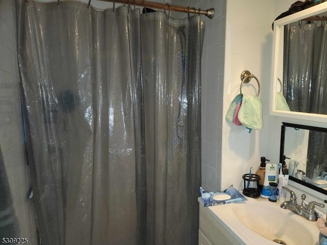 369 Lake Shore S Unit A, Montague Twp, NJ 07827 - bathroom with vanity and curtained shower