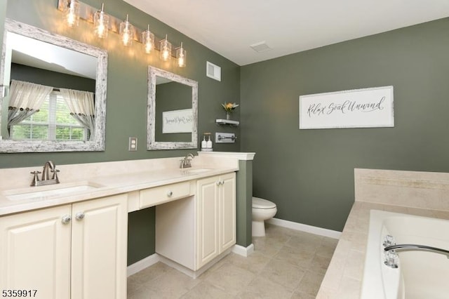 14 Coolidge Way, Montgomery Twp, NJ 08540 - bathroom featuring double vanity, a garden tub, toilet, baseboards, and tile patterned flooring