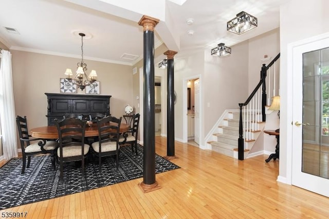 14 Coolidge Way, Montgomery Twp, NJ 08540 - dining area featuring light wood-style flooring, a chandelier, stairs, baseboards, and ornamental molding
