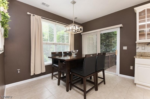 14 Coolidge Way, Montgomery Twp, NJ 08540 - dining room featuring a chandelier, baseboards, and light tile patterned flooring