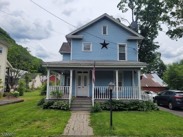 6 Charles St, Knowlton Twp, NJ 07840 - view of front of house featuring a porch and a front yard