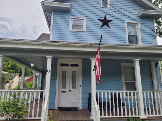 6 Charles St, Knowlton Twp, NJ 07840 - entrance to property with a porch