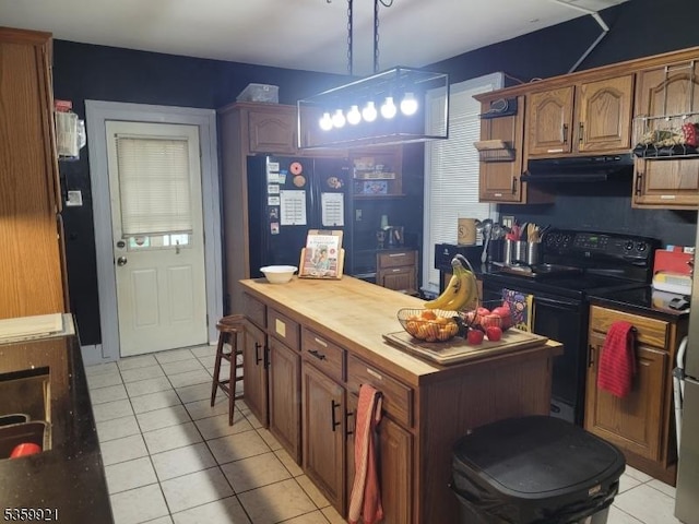 6 Charles St, Knowlton Twp, NJ 07840 - kitchen featuring black range with electric stovetop, ventilation hood, light tile patterned floors, and wooden counters