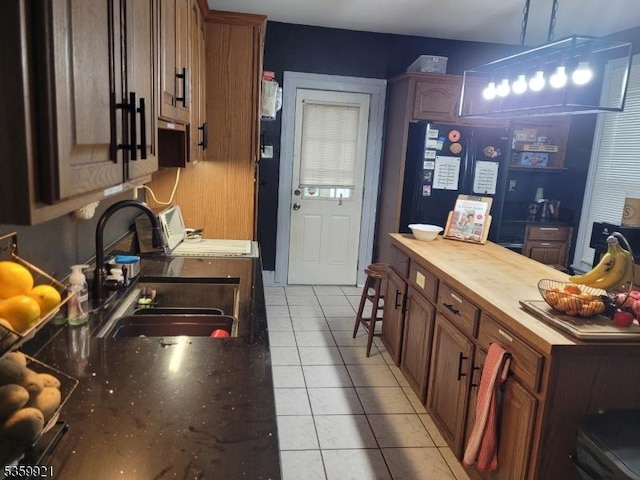 6 Charles St, Knowlton Twp, NJ 07840 - kitchen featuring butcher block countertops, freestanding refrigerator, and light tile patterned flooring