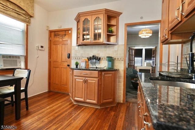 680 N 8th St, Newark City, NJ 07107 - bar area with dark wood finished floors, cooling unit, decorative backsplash, and a chandelier