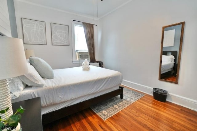 680 N 8th St, Newark City, NJ 07107 - bedroom with wood finished floors and ornamental molding