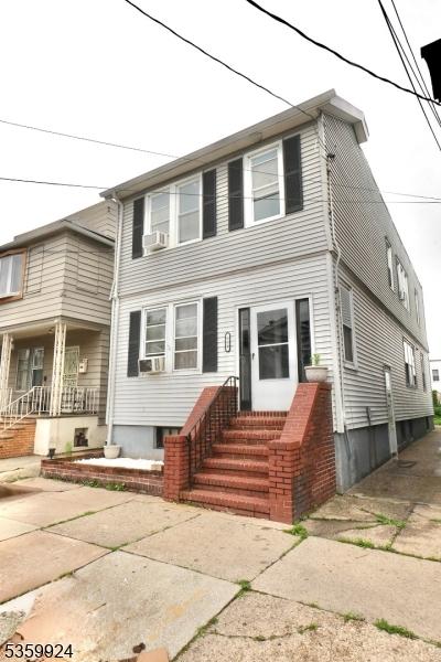 680 N 8th St, Newark City, NJ 07107 - traditional home with entry steps, a porch, and cooling unit