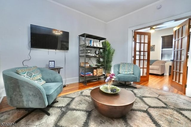 680 N 8th St, Newark City, NJ 07107 - living area with wood finished floors, crown molding, ceiling fan, and french doors