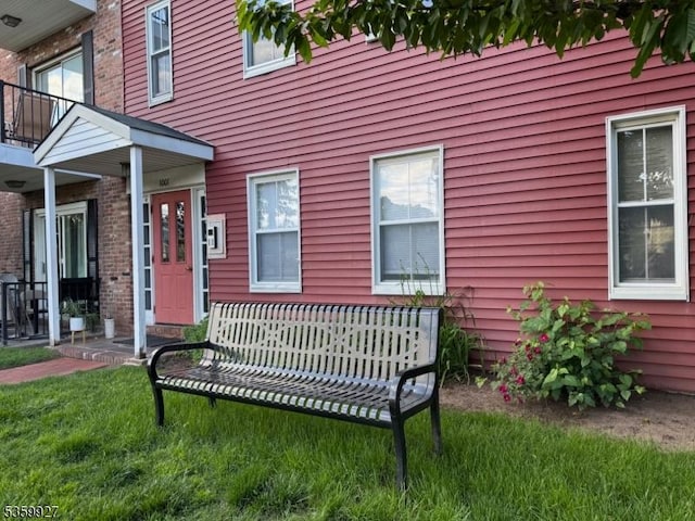 1001 Unicorn Way Unit D2, Clifton City, NJ 07011 - view of exterior entry featuring a lawn