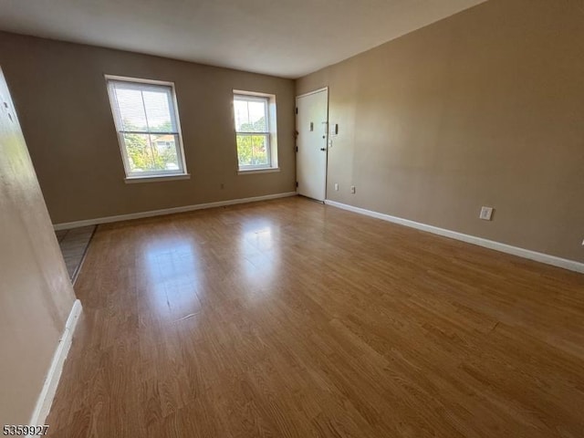 1001 Unicorn Way Unit D2, Clifton City, NJ 07011 - unfurnished room with wood finished floors and baseboards