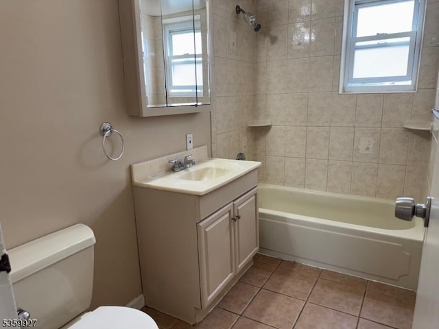 1001 Unicorn Way Unit D2, Clifton City, NJ 07011 - bathroom featuring toilet, vanity, tile patterned floors, washtub / shower combination, and plenty of natural light