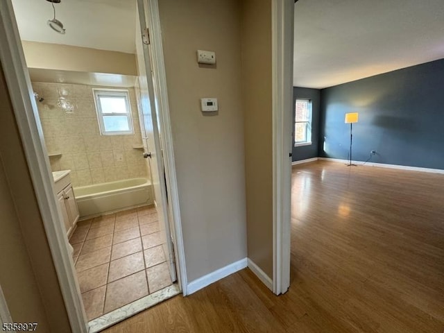 1001 Unicorn Way Unit D2, Clifton City, NJ 07011 - full bathroom featuring baseboards, wood finished floors, and vanity