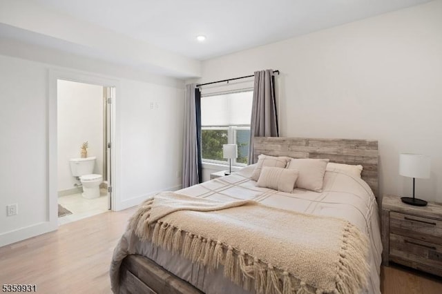 27 Leonard St Unit 2, Jersey City, NJ 07307 - bedroom with light wood-style floors, recessed lighting, and ensuite bathroom