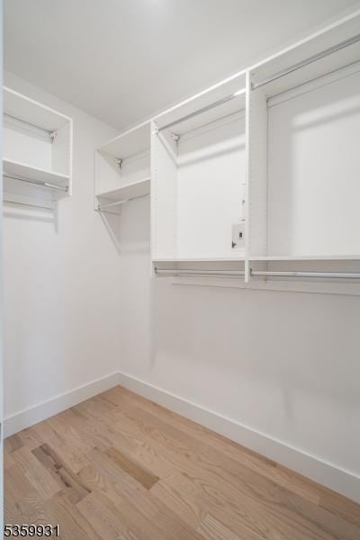 27 Leonard St Unit 2, Jersey City, NJ 07307 - walk in closet featuring wood finished floors