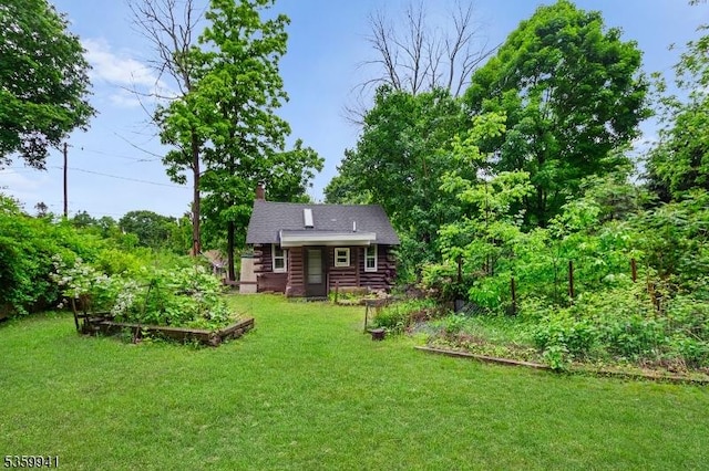 13 Alturas Rd, Vernon Twp, NJ 07422 - view of grassy yard with a garden