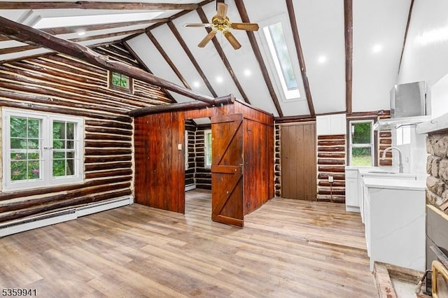 13 Alturas Rd, Vernon Twp, NJ 07422 - unfurnished living room featuring a sink, high vaulted ceiling, healthy amount of natural light, beam ceiling, and a ceiling fan