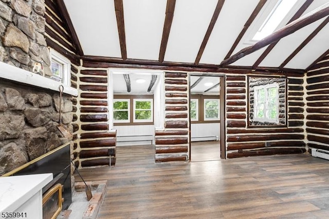 13 Alturas Rd, Vernon Twp, NJ 07422 - unfurnished living room with beam ceiling, a baseboard heating unit, high vaulted ceiling, and wood finished floors