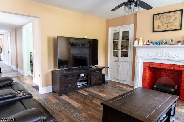 61 Park Ave, Flemington Boro, NJ 08822 - living area with wood finished floors, a ceiling fan, and a fireplace