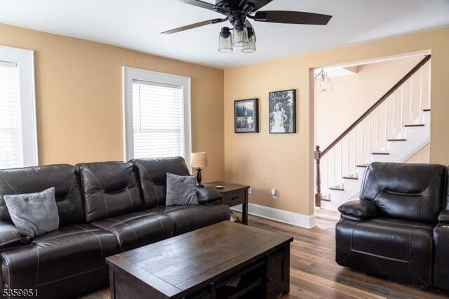 61 Park Ave, Flemington Boro, NJ 08822 - living area with stairway, ceiling fan, and dark wood finished floors