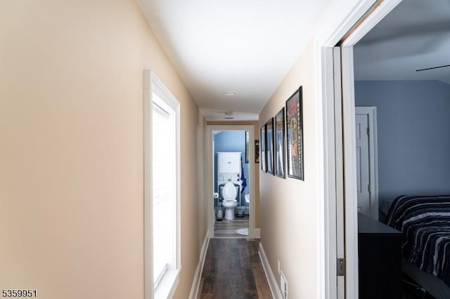 61 Park Ave, Flemington Boro, NJ 08822 - hall with dark wood-type flooring and baseboards