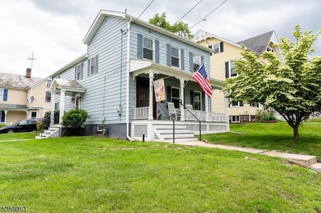 61 Park Ave, Flemington Boro, NJ 08822 - view of front of house featuring covered porch and a front lawn