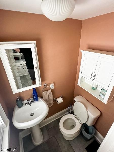 61 Park Ave, Flemington Boro, NJ 08822 - bathroom featuring toilet and tile patterned flooring