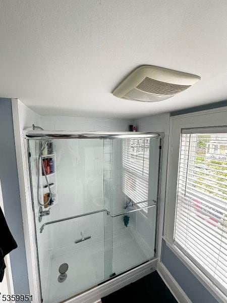 61 Park Ave, Flemington Boro, NJ 08822 - bathroom featuring a stall shower and baseboards